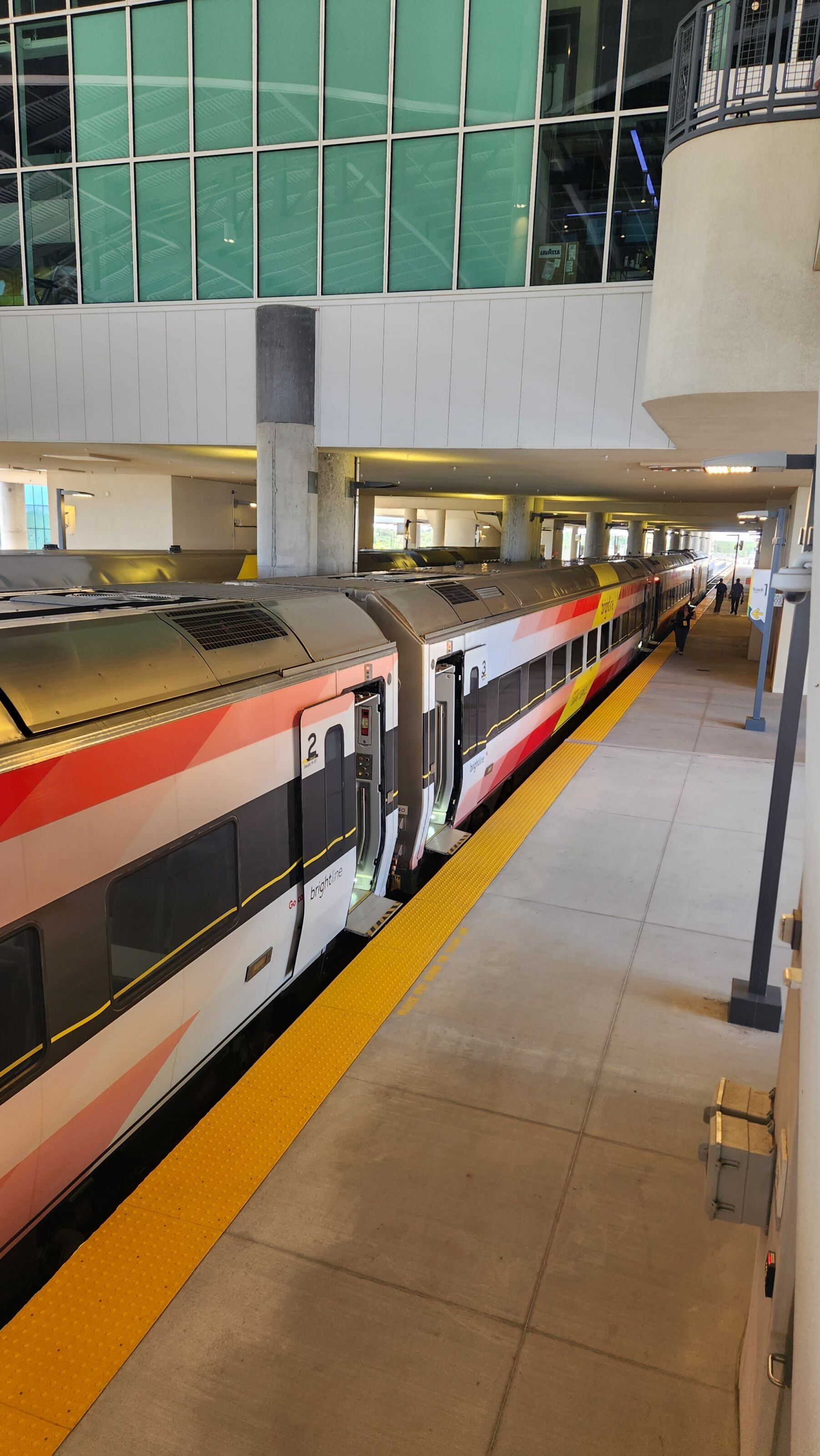 Brightline Train enters the station at Orlando International Airport